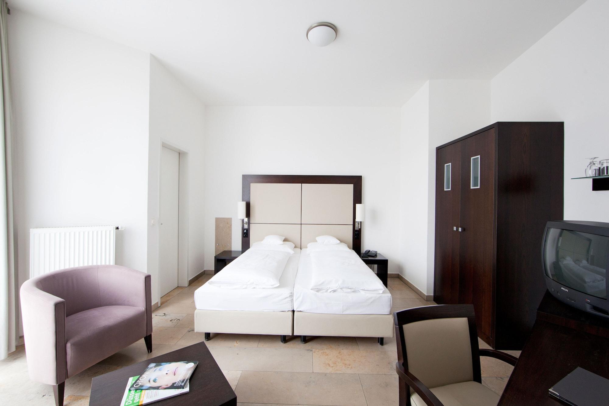Burns Art Hotel Дюссельдорф Номер фото